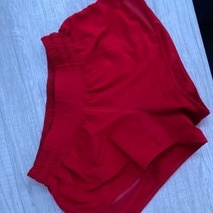 red lululemon hotty hot low rise shorts 2.5
